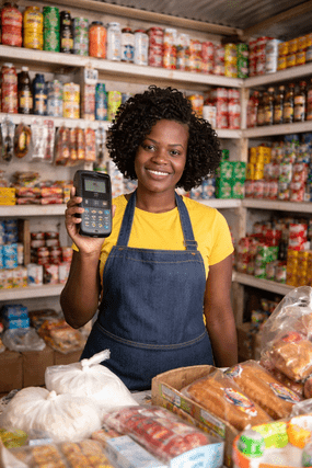 Kenyan lady shop owner using Devachi POS in her shop